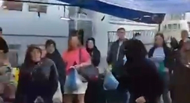 Bursa pazarında peçeyle gizlenen hırsızlar kovalamaca ile yakalandı