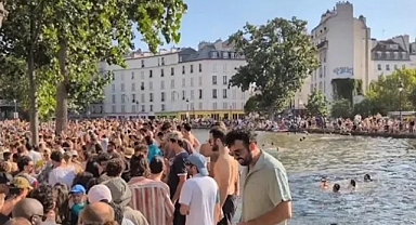 Paris’te Sıcak Alarmı: Eyfel Kulesi Yanındaki Havuzda Yüzen Türkler Gündem Oldu
